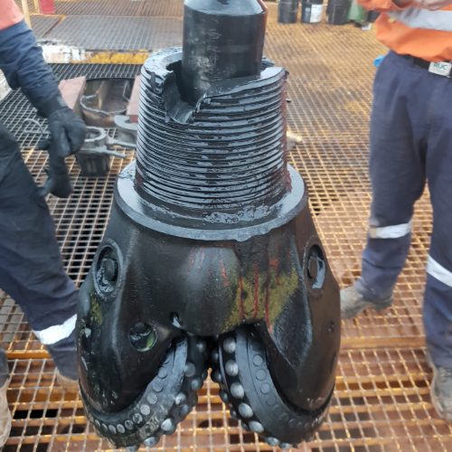 Downhole fishing of shanked tri-cone drill bit